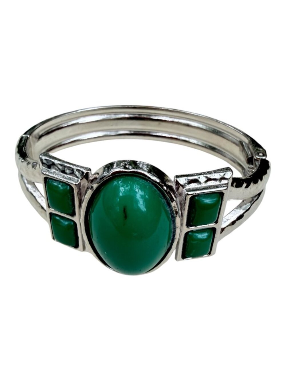 A vintage-style silver-tone bangle bracelet featuring a large green stone